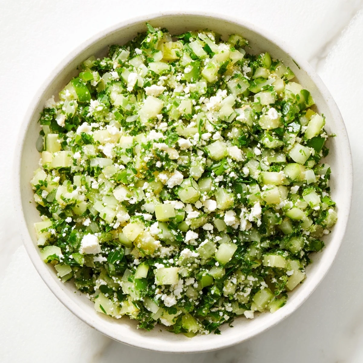 Delicious Green Goddess Cabbage Dip with a smooth, green dressing, served with chips for dipping and enjoyment.