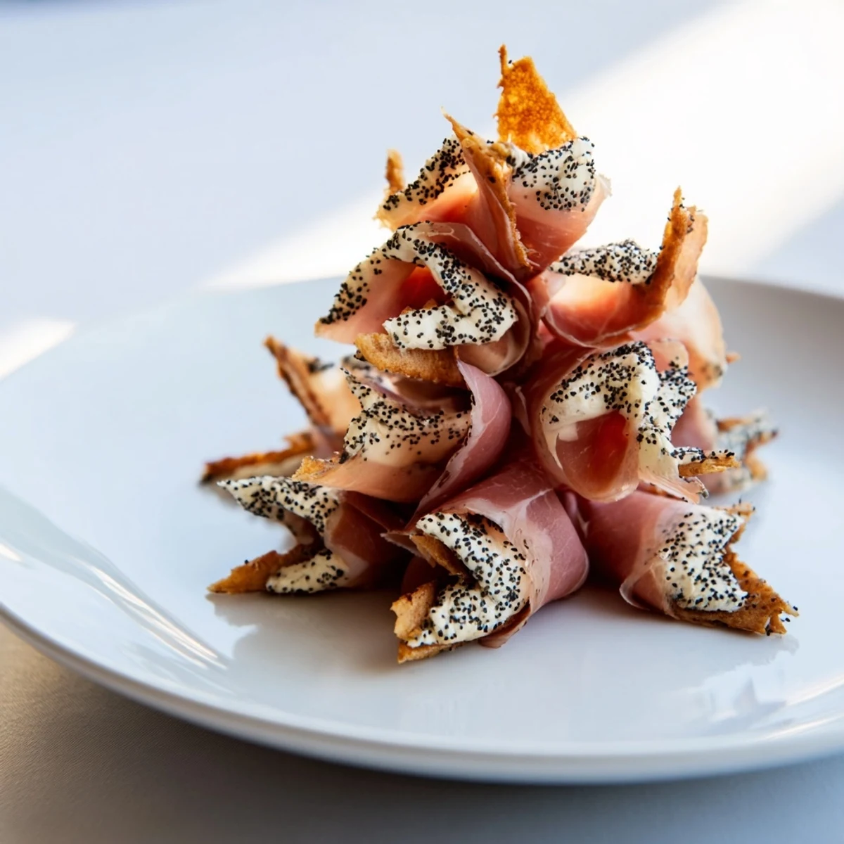Delicate Paper Crane appetizer, featuring artfully folded meats and crisp crackers, ready to serve.
