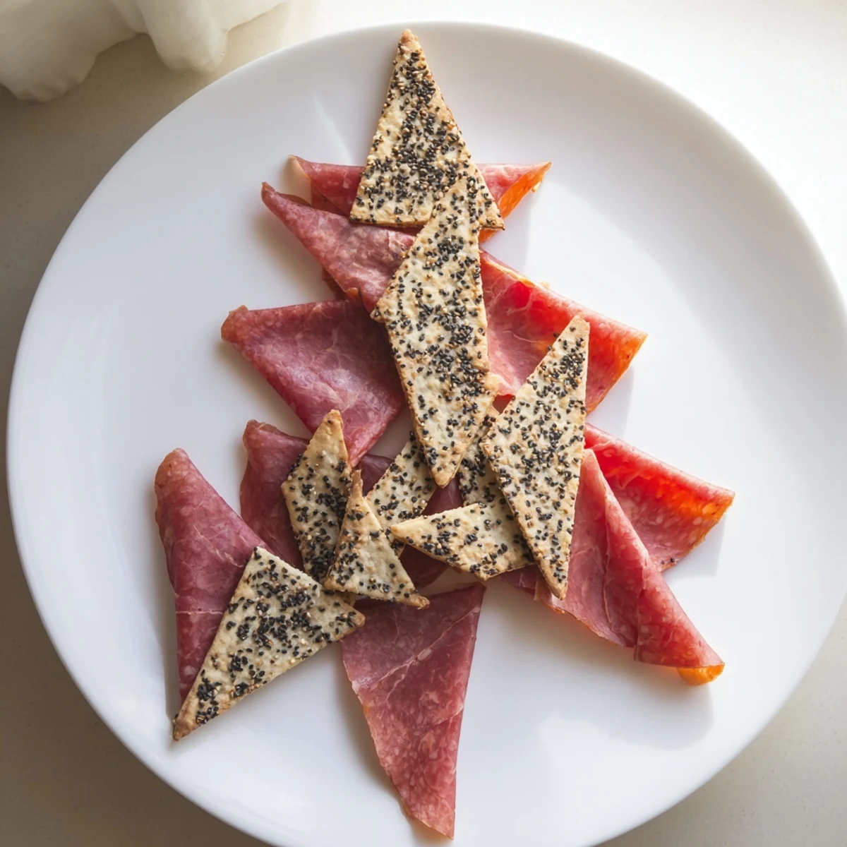 Beautifully arranged Paper Crane appetizer, made with prosciutto and crackers, perfect for a party.