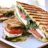Crispy sourdough filled with Caprese Pesto Panini-Style Grilled Cheese, a delicious Italian-inspired vegetarian lunch.