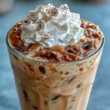 Refreshing skinny vanilla bean frappuccino made with espresso and almond milk, served in tall glasses.  