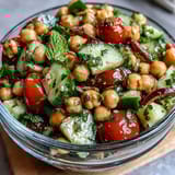 Healthy Easy Cucumber Chickpea Salad with Lemon Vinaigrette, packed with crisp cucumbers, protein-rich chickpeas, and a bright lemon dressing.