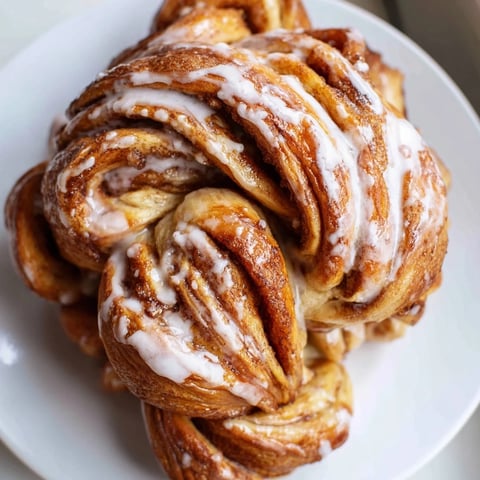 Warm, golden-brown Cinnamon Swirl Christmas Tree Bread, ideal for festive brunch and holiday sharing.