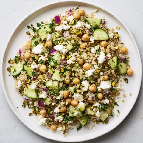 Enjoy a refreshing Jennifer Aniston Salad; chickpeas, cucumber, and herbs bring fantastic flavor combinations.