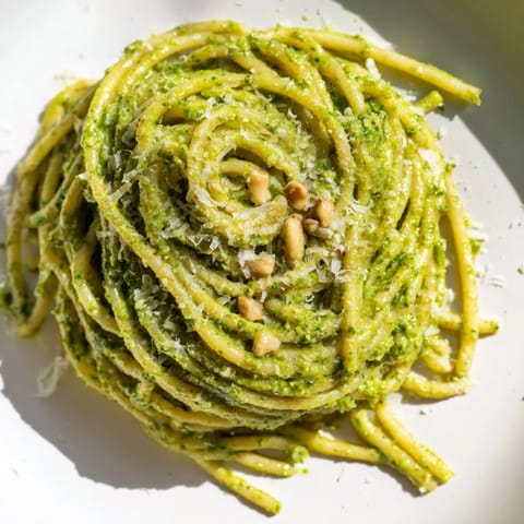 Golden toasted sunflower seeds and fresh basil blend into a rich, velvety sauce in this creamy sunflower seed pesto pasta.