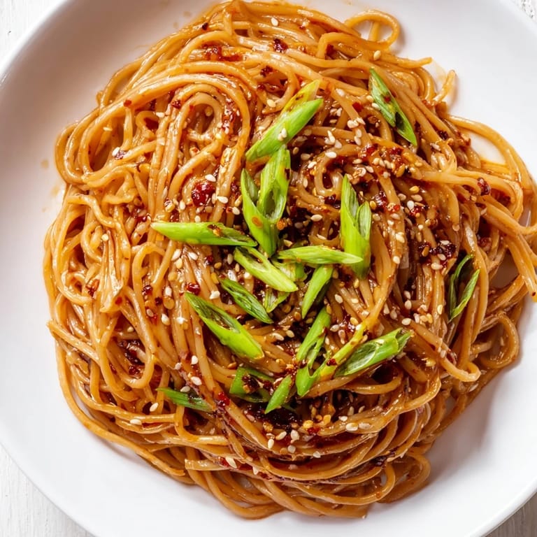 Vegan Garlic Chili Oil Noodles, a quick meal with tender noodles and a richly flavored chili sauce.