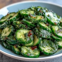 Crisp cucumber and radish slices with dill vinaigrette, a bright and refreshing spring salad perfect for light meals.